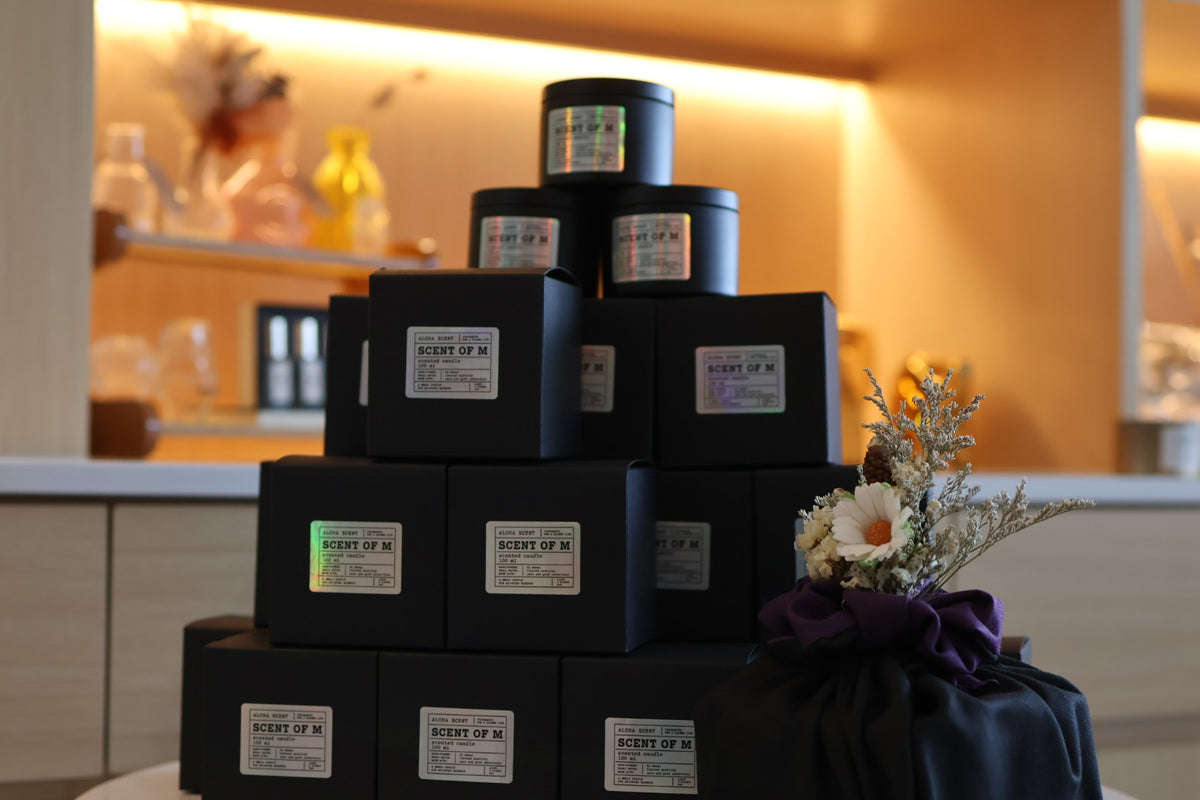 ALOHA SCENT SCENT OF M gift display with black boxes and floral wrapping